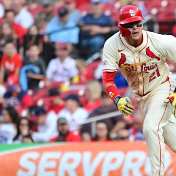 Sep 6, 2025; St. Louis, Missouri, USA;  St. Louis Cardinals outfielder Lars Nootbaar (21) digs for second base in a game against the San Francisco Giants at Busch Stadium. Mandatory Credit: Tim Vizer-Imagn Images