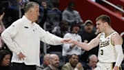 Purdue Boilermakers guard Braden Smith (3) bumps fist with head coach Matt Painter