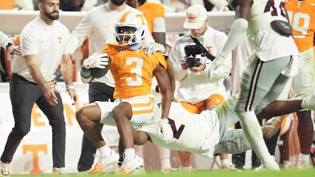 Tennessee wide receiver Squirrel White (3) is tackled by Mississippi State safety Isaac Smith (2).