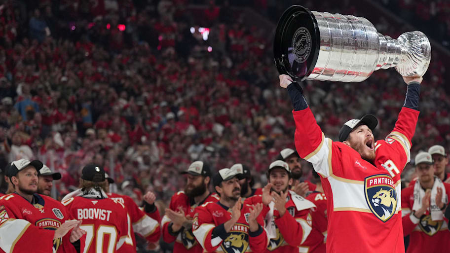 Florida Panthers left wing Matthew Tkachuk hoists the Stanley Cup. | Jim Rassol-Imagn Images