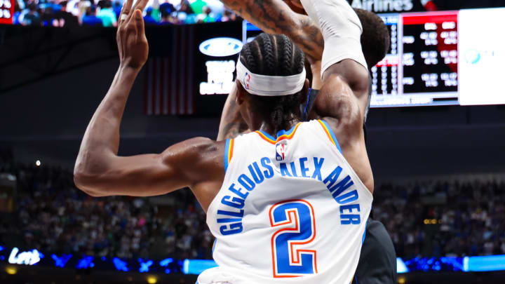 May 18, 2024; Dallas, Texas, USA;  Oklahoma City Thunder guard Shai Gilgeous-Alexander (2) fouls Dallas Mavericks forward P.J. Washington (25) during the fourth quarter during the second half in game six of the second round of the 2024 NBA playoffs at American Airlines Center. Mandatory Credit: Kevin Jairaj-USA TODAY Sports