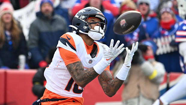 Denver Broncos wide receiver Troy Franklin (16) catches a touchdown pass against the Buffalo Bills during the first quarter.