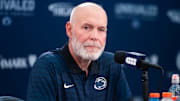 Penn State defensive coordinator Jim Knowles talks with reporters during football media day in Beaver Stadium.