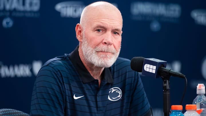 Penn State first-year defensive coordinator Jim Knowles talks with reporters during football media day in Beaver Stadium on Saturday, August 3, 2024, in State College
