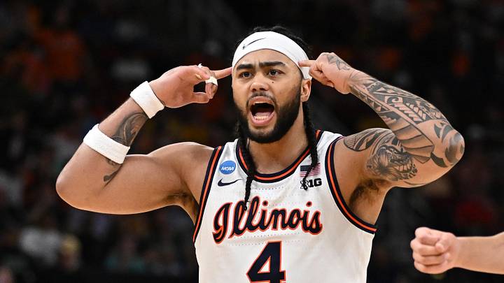 Mar 28, 2026; Houston, TX, USA; Illinois Fighting Illini guard Kylan Boswell (4) and guard Keaton Wagler (23) react in the second half against the Iowa Hawkeyes during an Elite Eight game of the South Regional of the men's 2026 NCAA Tournament at Toyota Center. Mandatory Credit: Maria Lysaker-Imagn Images