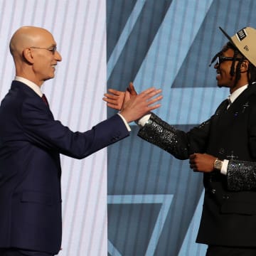 Rob Dillingham shakes hands with NBA Commissioner Adam Silver after being selected in the first round by the San Antonio Spurs in the 2024 NBA Draft at Barclays Center in New York on June 26, 2024. 