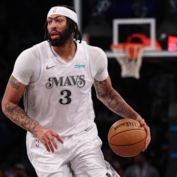 Mar 24, 2025; Brooklyn, New York, USA; Dallas Mavericks forward Anthony Davis (3) dribbles up court during the second half against the Brooklyn Nets at Barclays Center. Mandatory Credit: Vincent Carchietta-Imagn Images