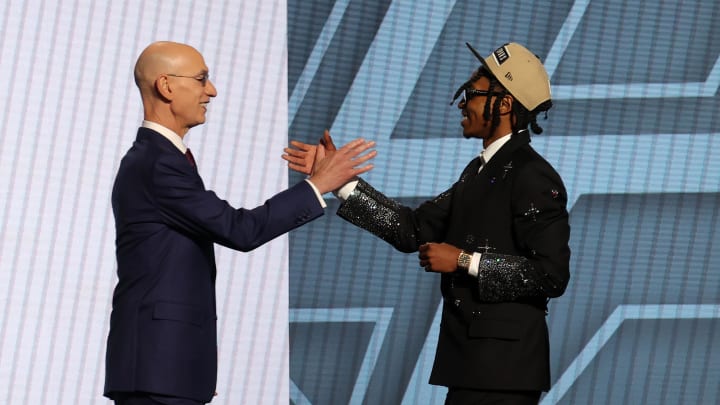 Jun 26, 2024; Brooklyn, NY, USA; Rob Dillingham shakes hands with NBA commissioner Adam Silver after being selected in the first round by the San Antonio Spurs in the 2024 NBA Draft at Barclays Center. Mandatory Credit: Brad Penner-USA TODAY Sports