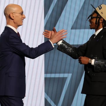Jun 26, 2024; Brooklyn, NY, USA; Rob Dillingham shakes hands with NBA commissioner Adam Silver after being selected in the first round by the San Antonio Spurs in the 2024 NBA Draft at Barclays Center. Mandatory Credit: Brad Penner-USA TODAY Sports