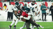 Jan 15, 2024; Tampa, Florida, USA; Tampa Bay Buccaneers wide receiver David Moore (19) is tackled by