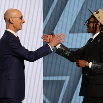 Jun 26, 2024; Brooklyn, NY, USA; Rob Dillingham shakes hands with NBA commissioner Adam Silver after being selected in the first round by the San Antonio Spurs in the 2024 NBA Draft at Barclays Center. Mandatory Credit: Brad Penner-USA TODAY Sports