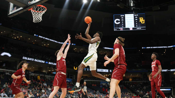 Mar 22, 2024; Memphis, TN, USA; Baylor Bears center Yves Missi (21) shoots against the Colgate Raiders during the first half of the NCAA Tournament First Round at FedExForum.