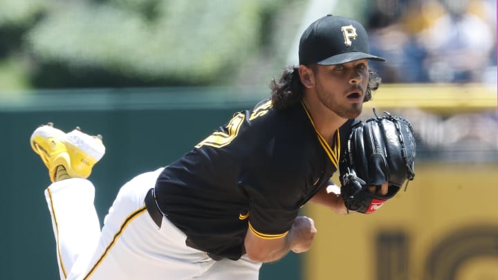 Jun 9, 2024; Pittsburgh, Pennsylvania, USA; Pittsburgh Pirates starting pitcher Jared Jones (37) delivers a pitch against the Minnesota Twins during the first inning at PNC Park. Mandatory Credit: Charles LeClaire-USA TODAY Sports