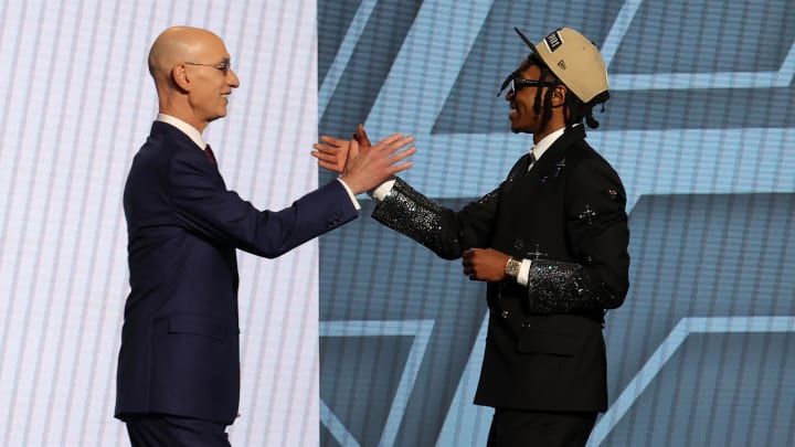 Jun 26, 2024; Brooklyn, NY, USA; Rob Dillingham shakes hands with NBA commissioner Adam Silver after being selected in the first round by the San Antonio Spurs in the 2024 NBA Draft at Barclays Center. Mandatory Credit: Brad Penner-USA TODAY Sports