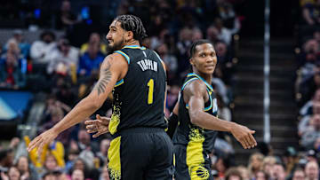 Feb 28, 2024; Indianapolis, Indiana, USA; Indiana Pacers forward Obi Toppin (1) and guard Bennedict Mathurin (00) celebrate a made basket in the second half against the New Orleans Pelicans at Gainbridge Fieldhouse. Mandatory Credit: Trevor Ruszkowski-Imagn Images
