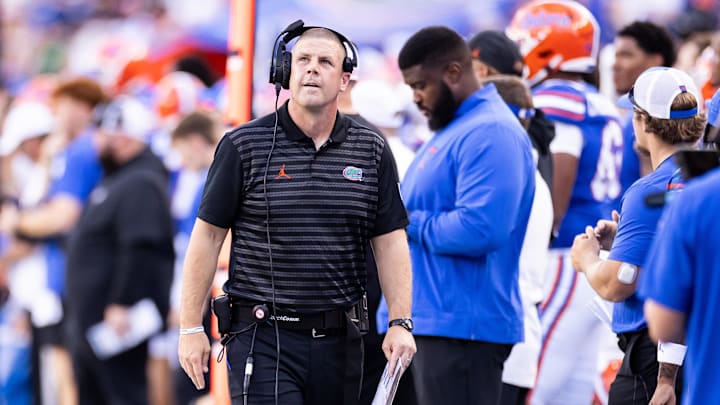 Aug 31, 2024; Gainesville, Florida, USA; Florida Gators head coach Billy Napier walks on the sideline against the Miami Hurricanes during the second half at Ben Hill Griffin Stadium. Mandatory Credit: Matt Pendleton-Imagn Images