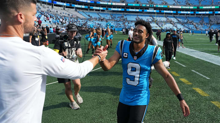 Sep 21, 2025; Charlotte, North Carolina, USA; Carolina Panthers head coach Dave Canales with quarterback Bryce Young (9) after the game at Bank of America Stadium. Sep 21, 2025; Charlotte, North Carolina, USA; Carolina Panthers head coach Dave Canales with quarterback Bryce Young (9) after the game at Bank of America Stadium.