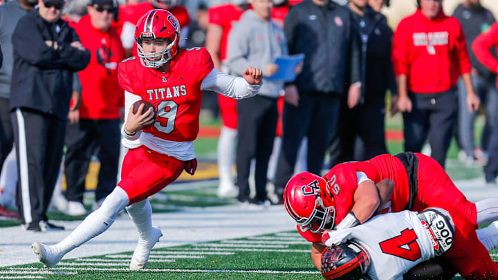 Carl Albert quarterback Kevin Sperry Jr. (9) runs the ball during the 5A high school football state championship game between Carl Albert and Del City at Chad Richison Stadium in Edmond, Okla., on Saturday, Dec. 2, 2023.