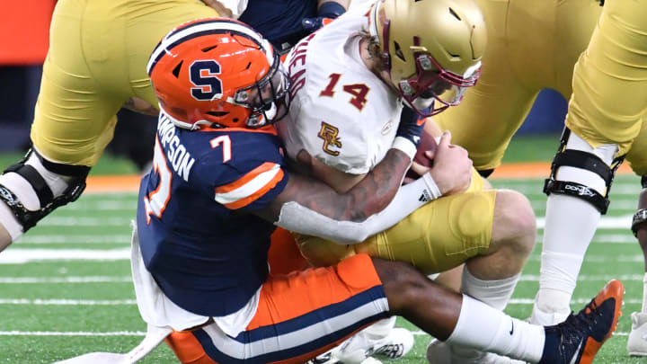 Oct 30, 2021; Syracuse, New York, USA; Syracuse Orange linebacker Stefon Thompson (7) sacks Boston College Eagles quarterback Emmett Morehead (14) in the second quarter at the Carrier Dome.