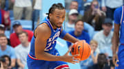 Nov 7, 2025; Chapel Hill, North Carolina, USA;  Kansas Jayhawks guard Darryn Peterson (22) on the fast break in the first half at Dean E. Smith Center. Mandatory Credit: Bob Donnan-Imagn Images
