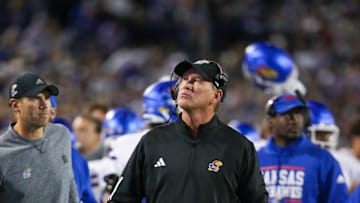 Oct 26, 2024; Manhattan, Kansas, USA; Kansas Jayhawks head coach Lance Leipold looks at the scoreboard during a break in the action against the Kansas State Wildcats at Bill Snyder Family Football Stadium. Mandatory Credit: Scott Sewell-Imagn Images