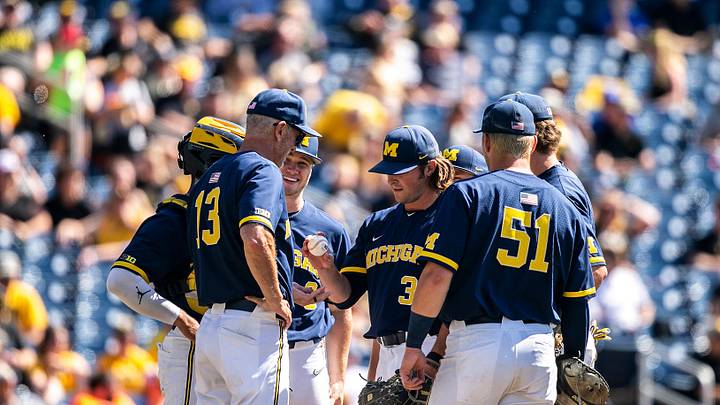 Michigan pitcher Eamon Horwedel is relieved by head coach Tracy Smith during a semifinal game of the Big Ten Baseball Tournament against Iowa, Saturday, May 27, 2023, at Charles Schwab Field in Omaha, Neb.