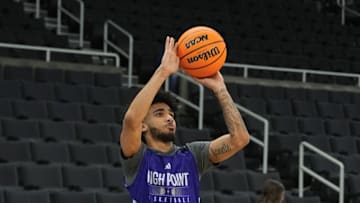 Mar 19, 2025; Providence, RI, USA; High Point Panthers guard Kezza Giffa (1) shoots a the ball during the first round practice session at Amica Mutual Pavilion. Mandatory Credit: Gregory Fisher-Imagn Images