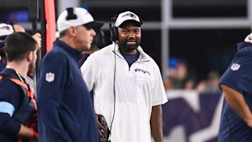 August 8, 2024; Foxborough, MA, USA;  New England Patriots head coach Jerod Mayo  works from the sideline during the first half against the Carolina Panthers at Gillette Stadium. Mandatory Credit: Eric Canha-Imagn Images