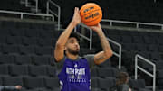 Mar 19, 2025; Providence, RI, USA; High Point Panthers guard Kezza Giffa (1) shoots a the ball during the first round practice session at Amica Mutual Pavilion. Mandatory Credit: Gregory Fisher-Imagn Images