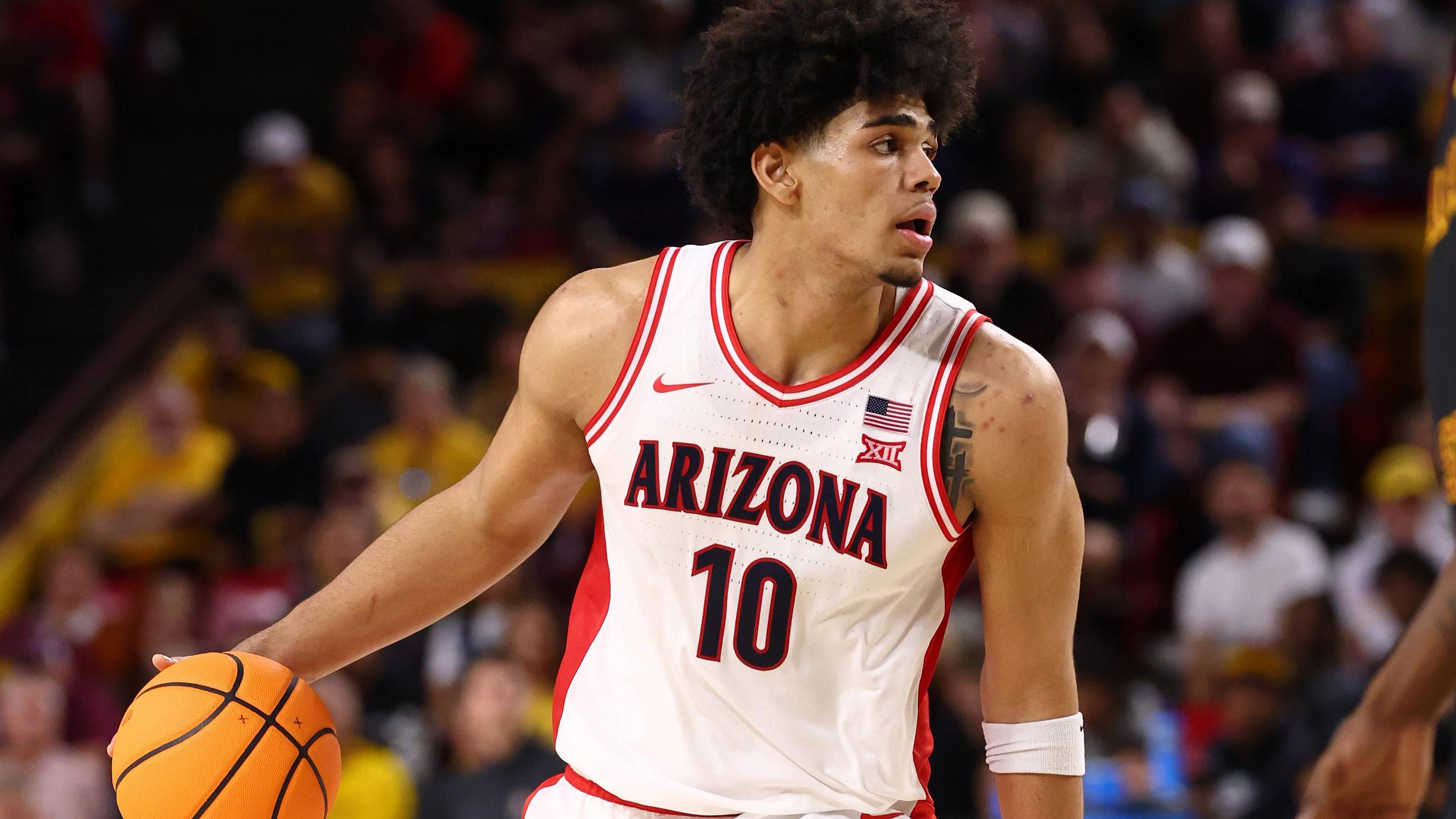 Jan 31, 2026; Tempe, Arizona, USA; Arizona Wildcats forward Koa Peat (10) against the Arizona State Sun Devils at Desert Financial Arena. Mandatory Credit: Mark J. Rebilas-Imagn Images