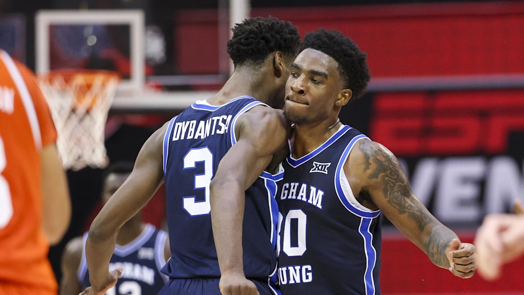 Nov 27, 2025; Kissimmee, Florida, USA; Brigham Young University Cougars forward AJ Dybantsa (3) and forward Kennard Davis Jr (30) react  during a time out against the Miami (FL) Hurricanes in the second half at State Farm Field House. Mandatory Credit: Nathan Ray Seebeck-Imagn Images