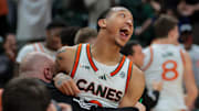 Feb 1, 2025; Coral Gables, Florida, USA; Miami Hurricanes guard Matthew Cleveland (0) celebrates after the game against the Notre Dame Fighting Irish at Watsco Center. Mandatory Credit: Sam Navarro-Imagn Images