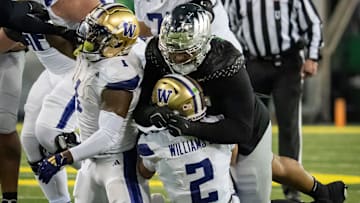 Oregon defensive lineman Derrick Harmon sacks Washington quarterback Demond Williams Jr. as the No. 1 Oregon Ducks host the Washington Huskies Saturday, Nov. 30, 2024 at Autzen Stadium in Eugene, Ore.