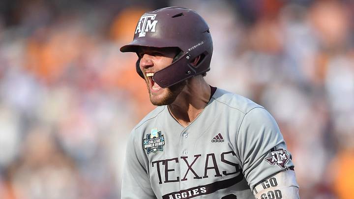 Texas A&M's Gavin Grahovac (9) celebrates an RBI-single during game three of the NCAA College World Series finals between Tennessee and Texas A&M at Charles Schwab Field in Omaha, Neb., on Monday, June 24, 2024.
