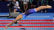 Aug 4, 2024; Nanterre, France; Torri Huske (USA) dives over Gretchen Walsh (USA) in the women’s 4 x 100-meter medley relay final during the Paris 2024 Olympic Summer Games at Paris La Défense Arena. Mandatory Credit: Grace Hollars-Imagn Images