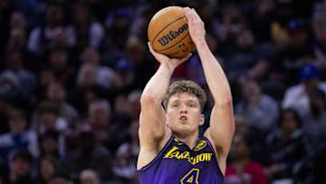 Jan 28, 2025; Philadelphia, Pennsylvania, USA; Los Angeles Lakers guard Dalton Knecht (4) shoots against the Philadelphia 76ers during the second quarter at Wells Fargo Center. Mandatory Credit: Bill Streicher-Imagn Images