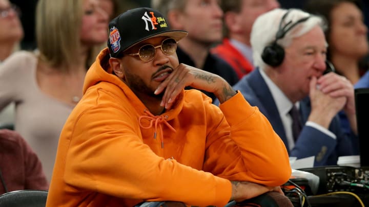 Mar 8, 2023; New York, NY, USA; New York Knicks former player Carmelo Anthony sits courtside during the second half between the Villanova Wildcats and the Georgetown Hoyas at Madison Square Garden. Mandatory Credit: Brad Penner-USA TODAY Sports