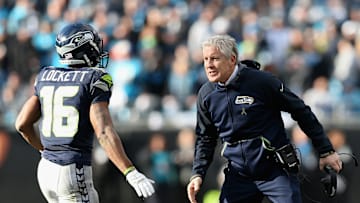 Pete Carroll with Tyler Lockett.