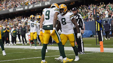 Nov 17, 2024; Chicago, Illinois, USA; Green Bay Packers running back Josh Jacobs (8) celebrates his touchdown against the Chicago Bears during the second half at Soldier Field. Mandatory Credit: David Banks-Imagn Images