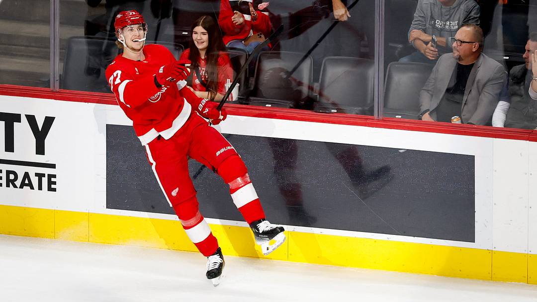 Mar 4, 2026; Detroit, Michigan, USA;  Detroit Red Wings defenseman Simon Edvinsson (77) celebrates after scoring in the first period against the Vegas Golden Knights at Little Caesars Arena. Mandatory Credit: Rick Osentoski-Imagn Images