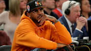 Mar 8, 2023; New York, NY, USA; New York Knicks former player Carmelo Anthony sits courtside during the second half between the Villanova Wildcats and the Georgetown Hoyas at Madison Square Garden. Mandatory Credit: Brad Penner-Imagn Images