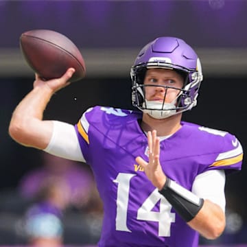 Aug 10, 2024; Minneapolis, Minnesota, USA; Minnesota Vikings quarterback Sam Darnold (14) passes against the Las Vegas Raiders in the first quarter at U.S. Bank Stadium.  