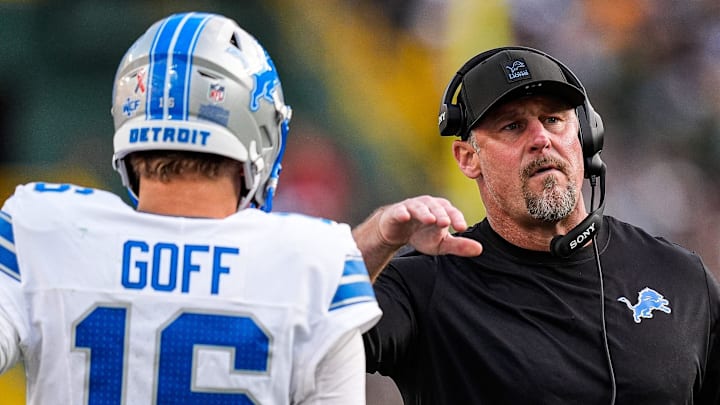Detroit Lions head coach Dan Campbell pats quarterback Jared Goff on the shoulder before a play against the Green Bay Packers during the second half at Lambeau Field in Green Bay, Wis., on Sunday, September 7, 2025.