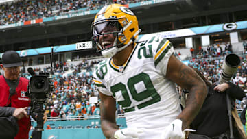 Dec 25, 2022; Miami Gardens, Florida, USA; Green Bay Packers cornerback Rasul Douglas (29) celebrates after intercepting the football during the fourth quarter against the Miami Dolphins at Hard Rock Stadium.