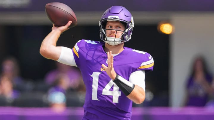 Aug 10, 2024; Minneapolis, Minnesota, USA; Minnesota Vikings quarterback Sam Darnold (14) passes against the Las Vegas Raiders in the first quarter at U.S. Bank Stadium. Mandatory Credit: Brad Rempel-USA TODAY Sports