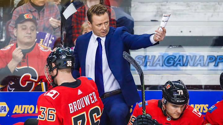Apr 3, 2018; Calgary, Alberta, CAN; Calgary Flames head coach Glen Gulutzan on his bench against the Arizona Coyotes during the first period at Scotiabank Saddledome. Mandatory Credit: Sergei Belski-Imagn Images