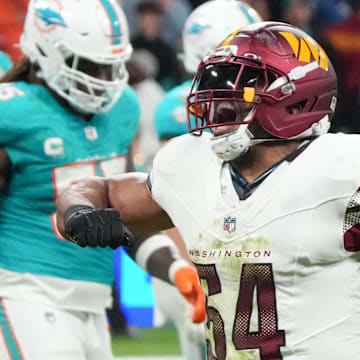 Nov 16, 2025; Madrid, Spain; Washington Commanders linebacker Bobby Wagner (54) reacts after a play against the Miami Dolphins in the fourth quarter during the 2025 NFL Madrid Game at Santiago Bernabeu Stadium. Mandatory Credit: Kirby Lee-Imagn Images