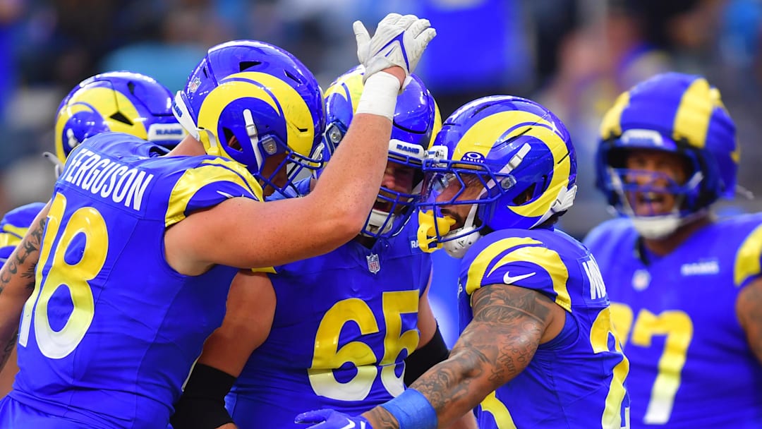 Dec 14, 2025; Inglewood, California, USA; Los Angeles Rams tight end Terrance Ferguson (18) celebrates with Los Angeles Rams running back Kyren Williams (23) after a touchdown during the second quarter against the Detroit Lions at SoFi Stadium. Mandatory Credit: Gary A. Vasquez-Imagn Images