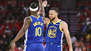 Apr 20, 2025; Houston, Texas, USA; Golden State Warriors guard Stephen Curry (30) celebrates with forward Jimmy Butler III (10) after a play during the third quarter against the Houston Rockets at Toyota Center. Mandatory Credit: Troy Taormina-Imagn Images