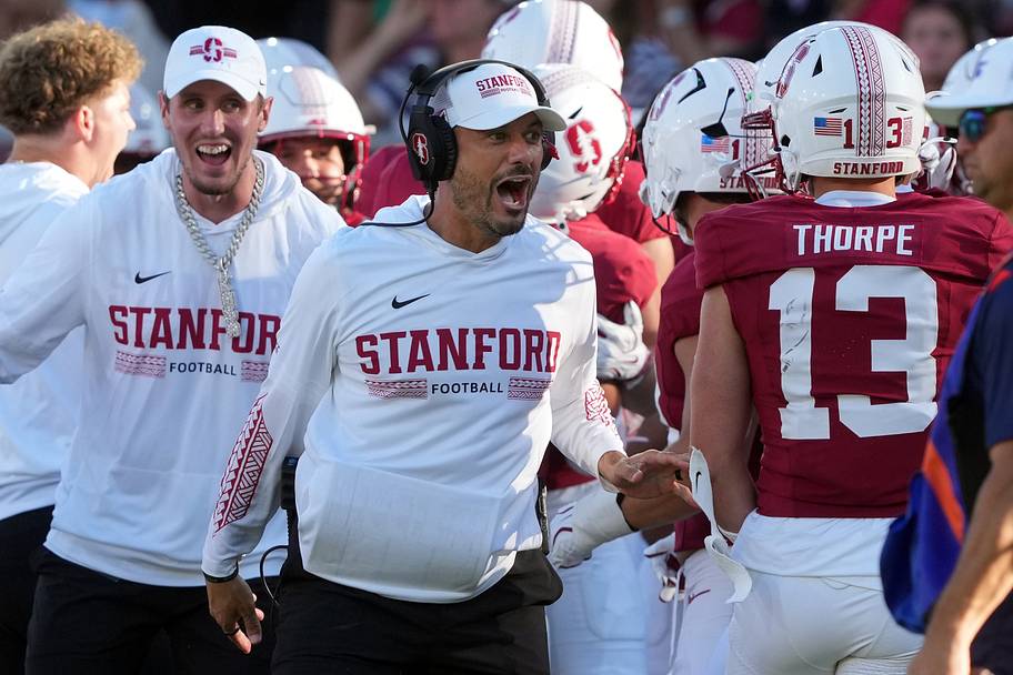 Stanford coach Tavita Pritchard celebrates after a safety against Hawaii.